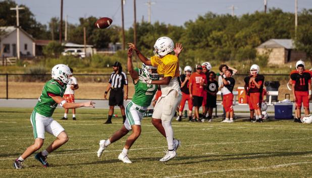 Bobcat #2 Joey Soito pressed the Longhorn and Rotan quarterbacks the entire scrimmage, forcing many mistakes as quarterbacks scrambled to get rid of the ball. Photo by Will Sadler