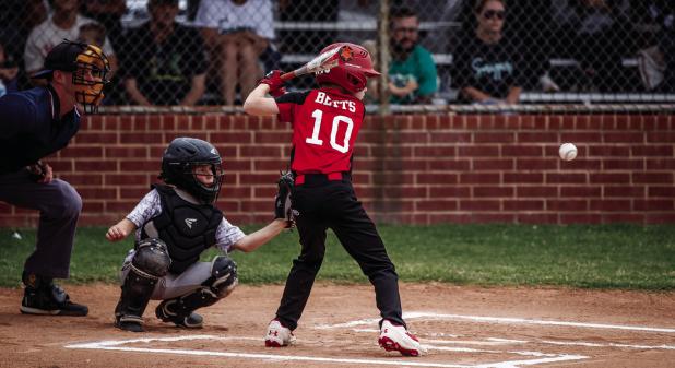 Olney Cub #10 Brayson Betts had his eye on the ball during the championship game. Photo by Will Sadler