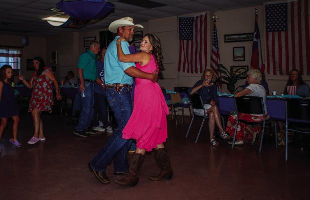 Cub Center Activity Director Candy Blair takes a break to dance with husband Coty Blair. Photo by Will Sadler