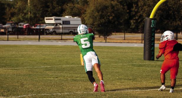 Bobcat #5 Hudson Hill stretches out for an offensive touchdown reception. Photo by Will Sadler