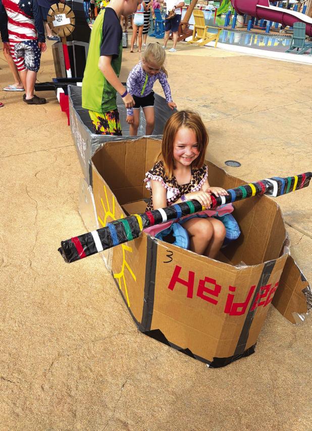 Heidi Marie Canada prepares her cardboardand- duct-tape craft of the water. Heidi Marie and other Olney scouts participated in the Scout Day at Castway Cove Waterpark on Memorial Day. Photo provided by Chris Garcia
