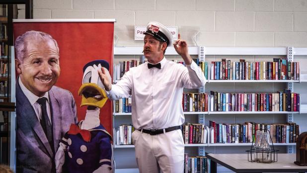 Towards the apex of Nick Waters’ story, he revealed that Clarence Nash, the voice for Donald Duck and many other cartoon characters, was the focus of the story to the delight of listeners. Photo by Will Sadler