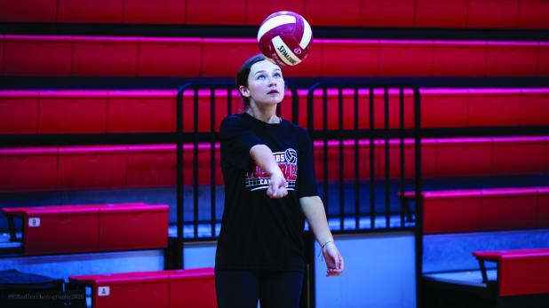 The afternoon camp hosted older girls and harder skills to learn, camp attendee shown here practicing hitting the volleyball with their inner arms. Photo by Will Sadler
