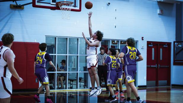 Cub #15 Luke Lane kept the pressure on Bulldog defenders under the bucket and scored 12 points.