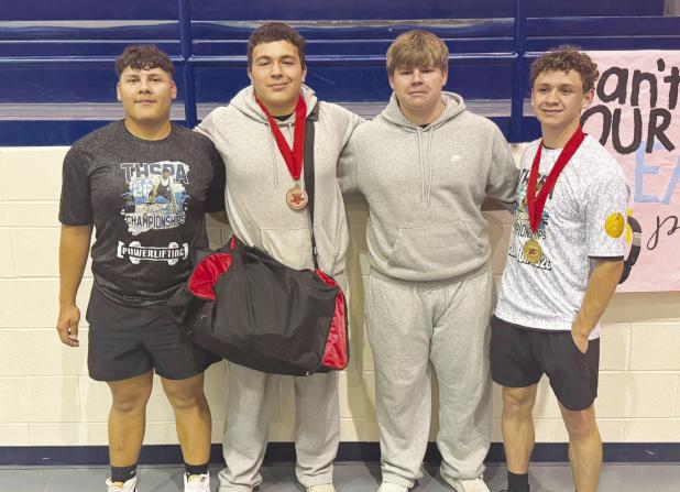 Two OHS Cub Powerlifters competed well enough in the regionals in Decatur to qualify for the state contest. Those Cubs headed to state are Maddox Johnson [far right], who also beat the regional bench press record in his class, and Jacobi Esquivel. The ent