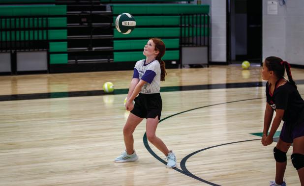 Emory Shields returning a volley during summer skills training. Photos by Will Sadler