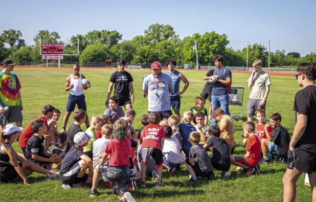 Lil’ Cubs learn new skills at OES football camp