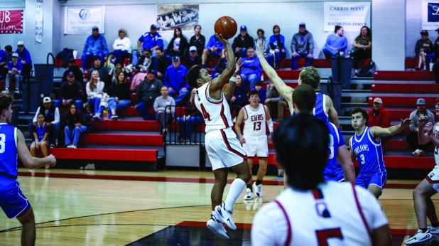Cub #4 Jamarcus Collins was fun and exciting to watch against the Panther matchup even with the loss, shown going up with a floater inside the line. Photo by Will Sadler