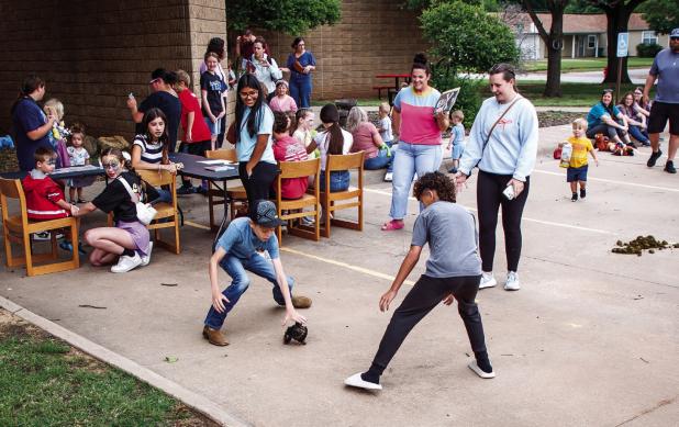 During the Olney Librar’s Annual Pet Show, there was an impromptu chicken chase after one attendee’s chicken escaped his enclosure on more than one occasion. Children enjoyed chasing the chicken around the parking lot thinking it was a fun summertime