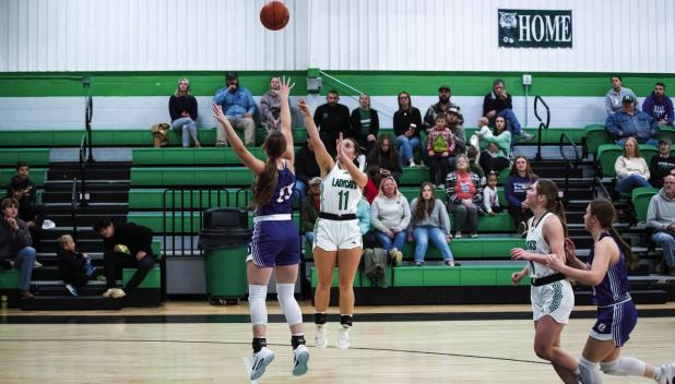 Ladycat #11 Emma Hawkins had a big night on offense, scoring 11 points with a combination of floaters, drives to the bucket and shooting from the outside. Photo by Will Sadler