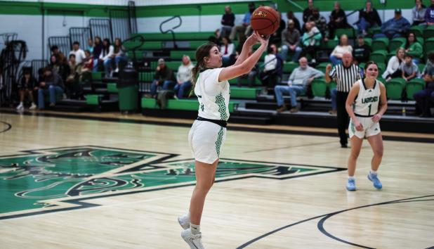 Ladycat #5 Kinzlee Sweat scored 6 points for the night, fighting hard for the Ladycats. Sweat could play a big role this season as her experience grows. Photo by Will Sadler