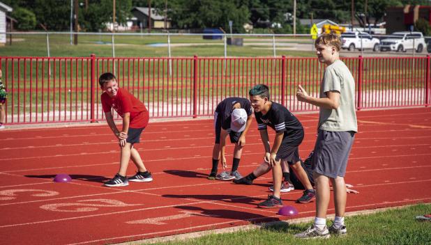 Lil’ Cubs learn new skills at OES football camp