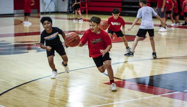 An activity that the campers really enjoyed was a king of the basket game, who ever scored kept control of the basket and kept shooting against a new player. Photo by Will Sadler
