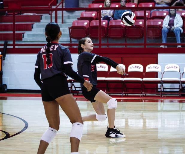OJH Lady Cub #14 Denalee Wales defends against a Lady Indian kill shot. Photo by Will Sadler