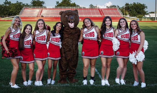 The Olney High School Cheerleaders, along with Cub mascot Charlie, entertained attendees with the school fight song and other cheers. Photo by Will Sadler