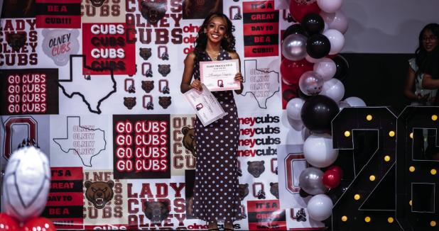 Ana Vaquez received the Lady Cub Track and Field Cub Pride Award. Photo by Will Sadler