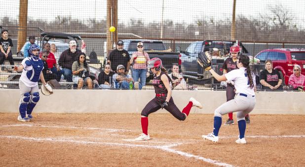 OHS Lady Cub #6 Ava Stewart flies across home play to score for the Lady Cubs during the Knox City win. Photo by Will Sadler