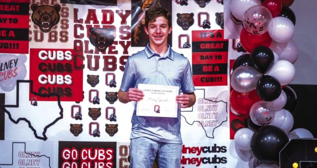 OHS Cub Wesley Symank was presented with Newcomer of the Year for Cross Country. Photo by Will Sadler