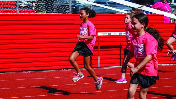 Students of Olney Elementary battled with each other for ribbons and bragging rights during the annual end of year field day. Photo by Will Sadler