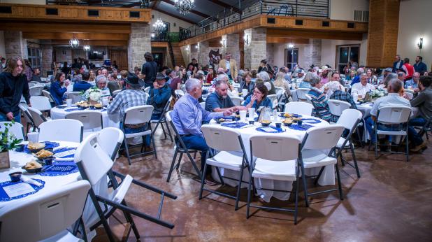 The Olney Chamber of Commerce marked its 100th banquet on Nov. 13 at the Durange Rustic Retreat with a full house, music, food by Dos Leones of Graham, fundraising auctions, and reminiscences. Photo by Will Sadler