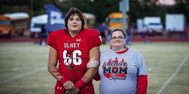 OHS Cub #66 Benny Fuselier was escorted by Melissa Scott. Benny played guard and defensive tackle for the Cubs for 6 years and was known for his outstanding sportsmanship.