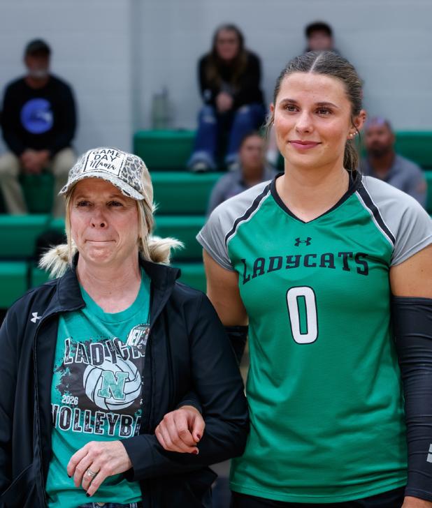 NHS Senior Ladycat Kenzie King escorted for Senior Night recognition by Nicky King.