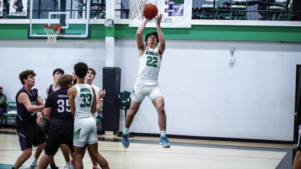 Bobcat #22 Mikey Soito with an easy layup with the support of teammates against the Greyhounds. Photo by Will Sadler