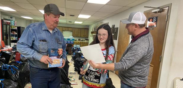 Sixth-grader raises money, buys books for Toys for Tots