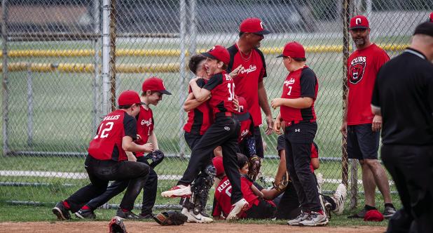 The 10U Olney Cubs celebrate after claiming the 2025 Championship title! Way to go, Cubs! Photo by Will Sadler