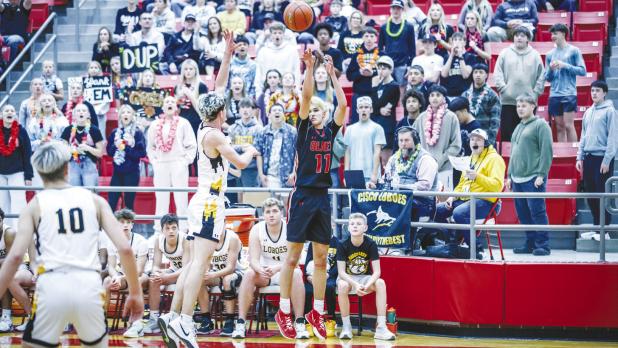OHS Cub #11 Tucker Cortinez led an aerial assault on the Lobos and held his own under the bucket for the night, nailing 3 from outside the line and 2 more under the net in the battle against the Lobos. Photo by Will Sadler