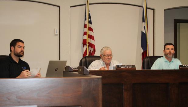 City Councilmembers put the final touches on their fiscal year 2026-2027 budget and tax rate at their Sept. 14 meeting. L-R: Councilmember Colson Ballard, Mayor Pro Tem Chuck Stennett, and Mayor Rue Rogers listen to a budget briefing from Olney Economic D