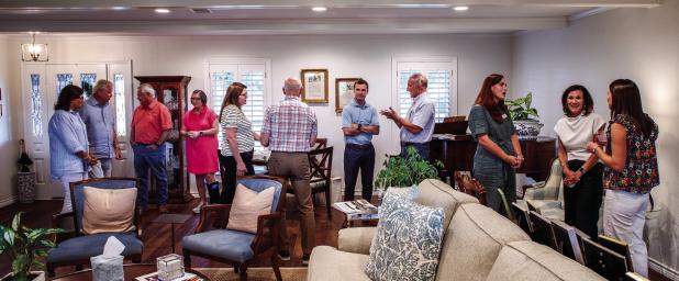 Olney community members gathered at the home of Mayor Rue Rogers and his wife, Anna, for a reception for the Wichita Falls Area Food Bank, and to learn about the organization’s needs and plans in the coming year. Photo by Will Sadler