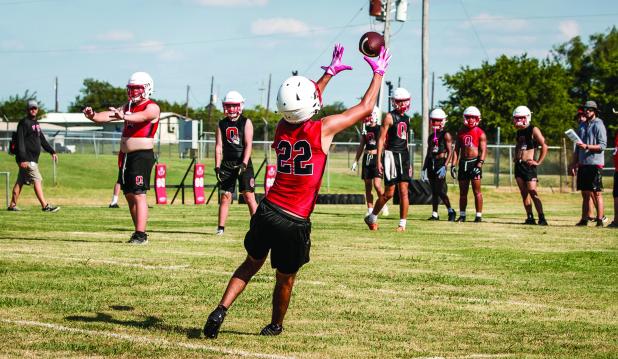 Many Cub players would love to capture a starting position as a receiver for this season’s varsity team, but only players with great hand and eye coordination will make the cut. It takes more than fast feet to be a starting receiver. Photo by Will Sadle