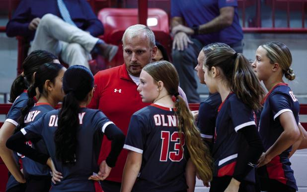 OJH 7th Grade Lady Cubs Coach Eric Symank gives final instructions before the Lady Cubs take the court against the Lady Indians. Photo by Will Sadler