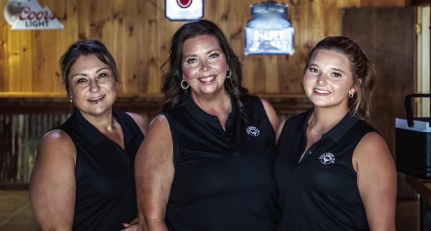 The trio of Olney Country Club workers had their hands full during the Tourney, but golfers were in great hands with these three. [L-R] Holly Pannell, Julie Lane, Marlee Lane Photo by Will Sadler