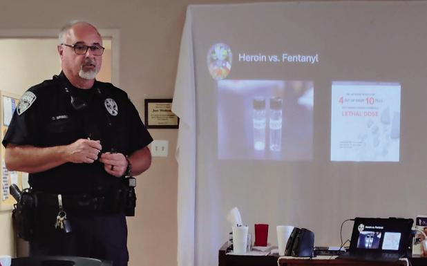 Olney Police Chief Dan Birbeck talks to attendees at a May 20 seminar at the Olney Senior Cub Center about how to recognize an opioid overdose and administer Narcan. Photo by Gina Keating