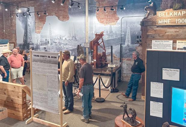 Visitors wander through the newly opened petroleum industry display at the Young County Museum of History and Culture during its anniversary celebration on Sept. 5 in Graham. Photo courtesy of the Young County Museum of History and Culture