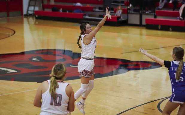 Lady Cubs battle Trojans in District clash