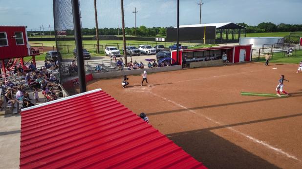 Friends and family enjoyed watching a summer softball game against the Lady Cubs and Lady Heat. Photo by Will Sadler
