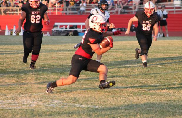 The Cubs’ Kyle Stewart makes a breakaway run during a scoring drive to help the Cubs cement their 42-36 victory over the Archer City Wildcats. Photo by Kailyn Altmiller