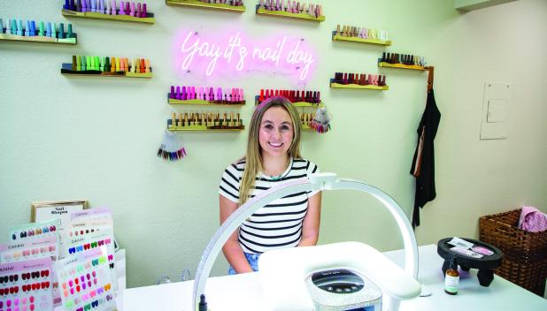 Cterling Hopkins opened a nail service, Nails by Cterling, in the Fringe salon on South Grand Avenue in May. Photo by Will Sadler