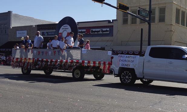 The First Baptist Church of Olney put together a 1950s American-themed float for the Stars and Stripes in Young County parade in Graham. Photo by Will Sadler