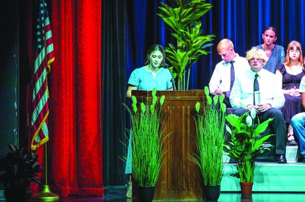 Morgan Simmons, valedictorian and president of the Class of 2026, addresses her classmates and the audience at the Senior Awards Night. Photo by Will Sadler