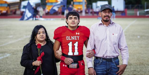 OHS Cub #11 Braulio Flores was escorted by Juanis and Carlos Flores. Braulio played wide receiver and cornerback for the Cubs for 4 years. Braulio plans to join the workforce and his favorite memory is the first time he made the playoffs with the Cubs.