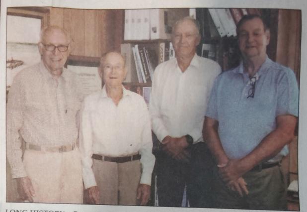 (LEFT): L.F. and Carla Perry’s daughter Deborah Perry German created this shadow box containing the first patents for CEMCO’s portable concrete batch plants and her father’s drafting tools. (RIGHT): In 2010, the Olney Enterprise snapped this photo o