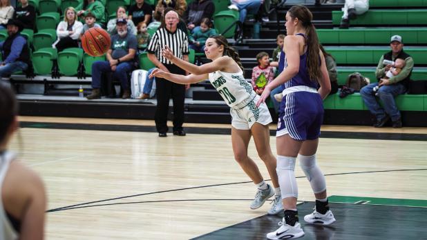 Ladycat #20 Greenleigh Moore had sparks in the passing game for the night. Moore is a good scrambler, and with more time on the boards this season should become a great asset on defense and as a support player for the shooters on the team. Photo by Will S