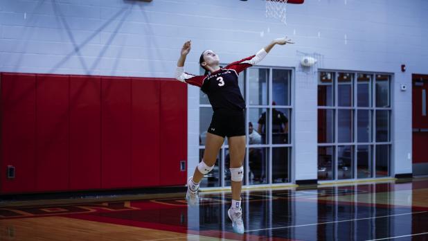 Lady Cub #3 Oaklan Hopkins is one of many weapons the team has; Hopkins sends laserguided spikes across the net against defenders. Photo by Will Sadler