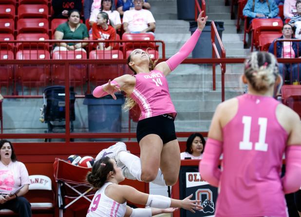 Lady Cub #14 Angel Turner is an exciting team fighter, always sending fire across the net at opposing defenders. Photo by Will Sadler