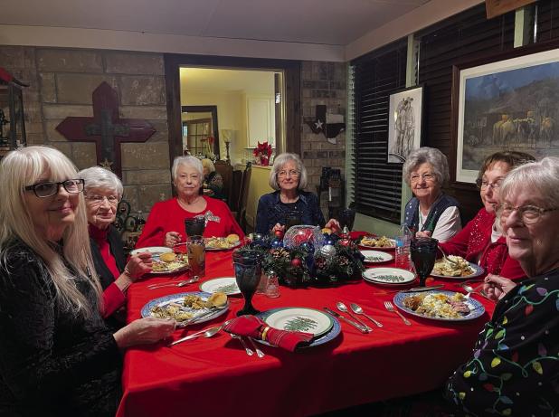 The Amity Club held its Christmas party at the home of Donna Sullivan this year. (L-R): Judy Averett, Roslyn Fowler, Donna Sullivan, Phyllis Whitsitt, Jeanie Spivey, Margie Snyder, Carol Ballard. Photo by Carol Vorel