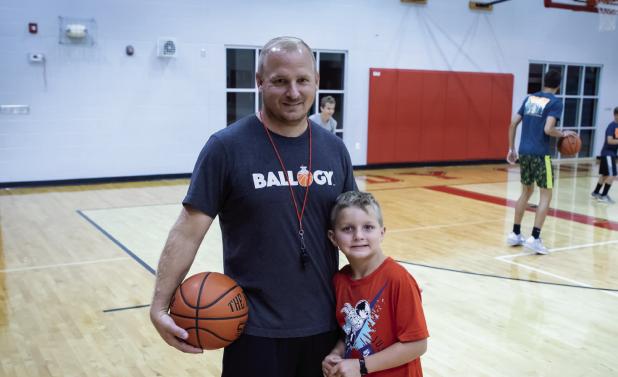 New basketball coach hosts